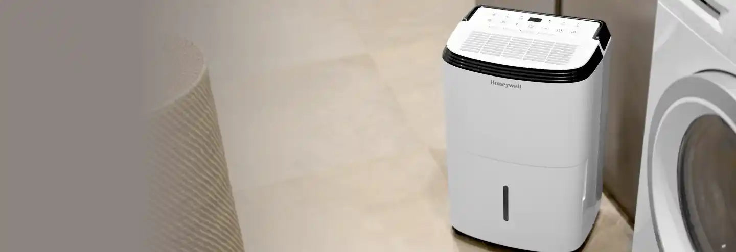 Laundry dehumidifier for drying clothes next to a washing machine
