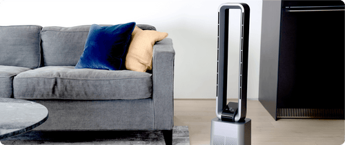 Bladeless fan next to grey sofa